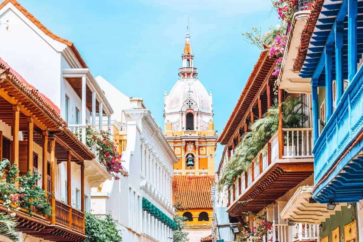Colourful balconies and the top of a cathedral in Cartagena, Colombia