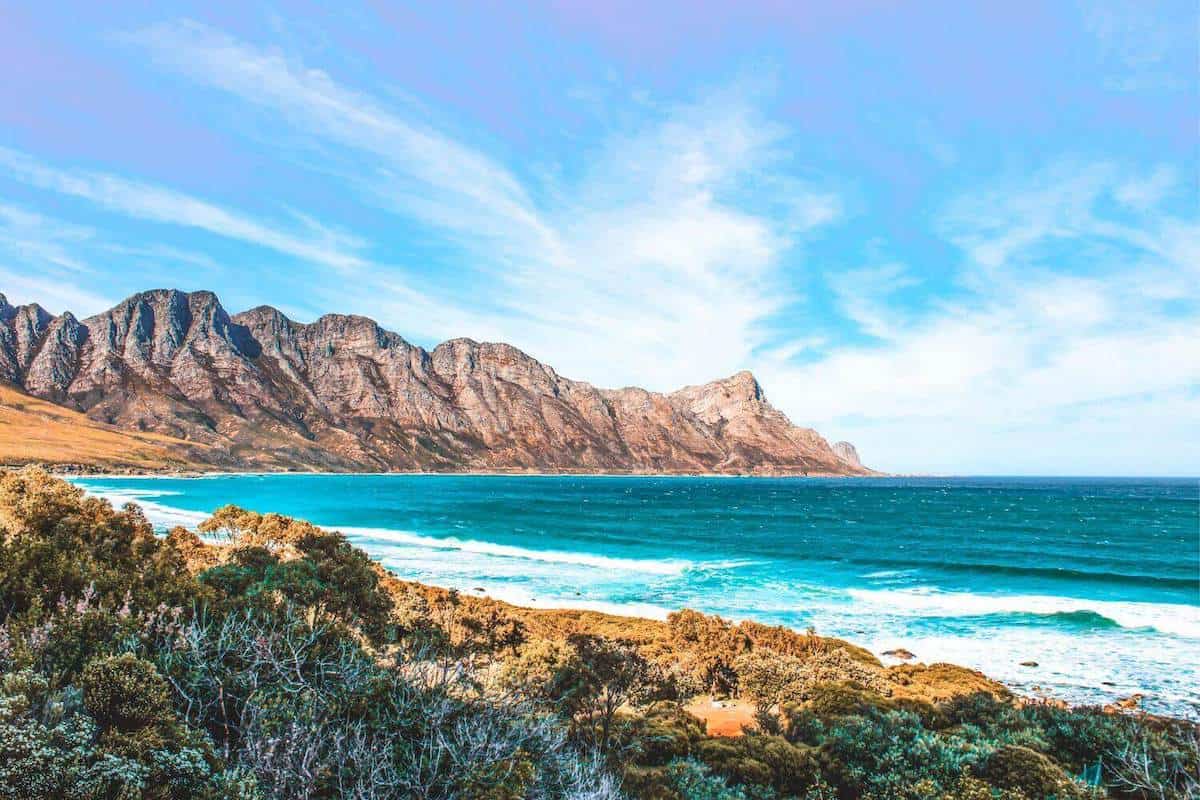 View across the sea towards rugged mountains in South Africa