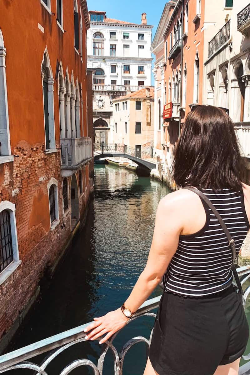 Hannah looking out over a canal in Venice