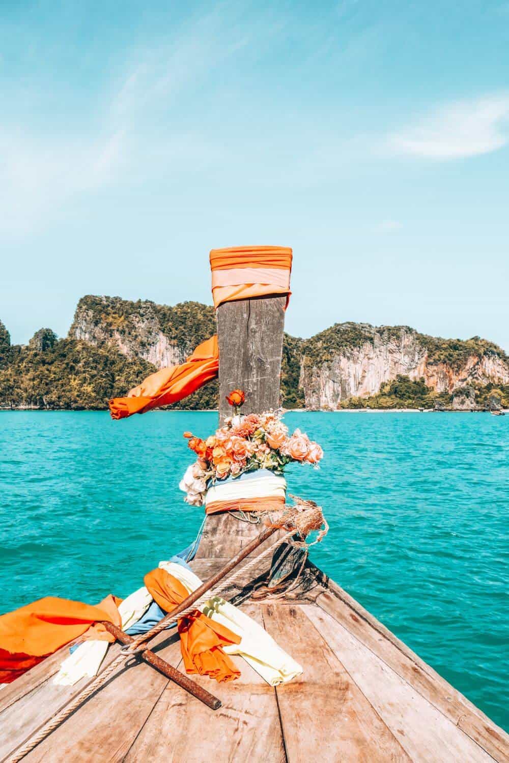 A view across water from a longtail boat in Thailand