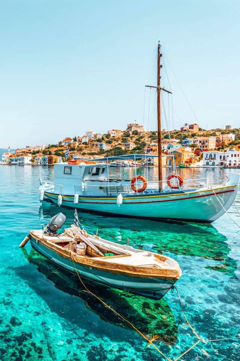 Two boats in a harbour in Greece on a sunny summer's day