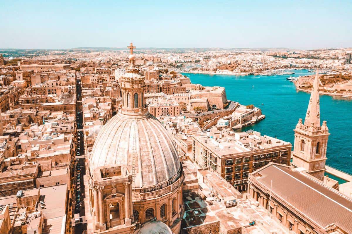 A view across old, golden buildings in the city of Valletta in Malta