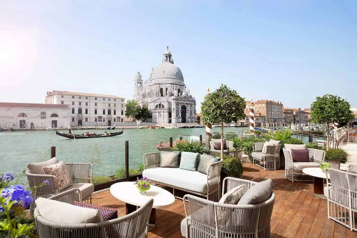 An outdoor terrace overlooking the Grand Canal and Basilica of Santa Maria della Salute in Venice