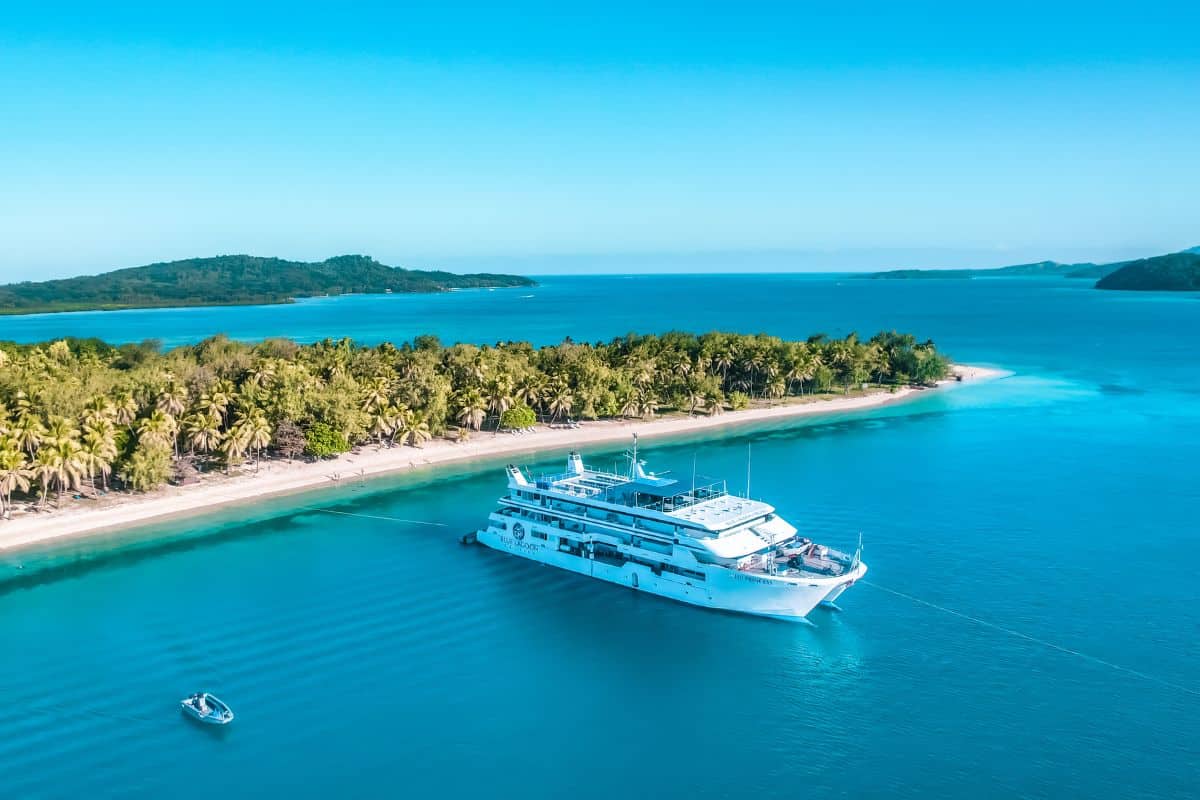 A small ship cruise near a paradise island in Fiji