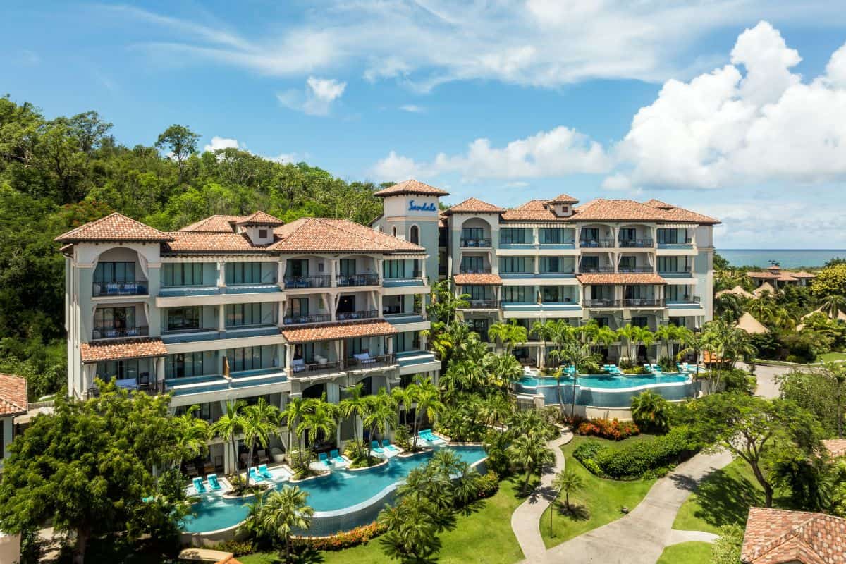 An authentic tropical resort set amongst greenery in the Caribbean