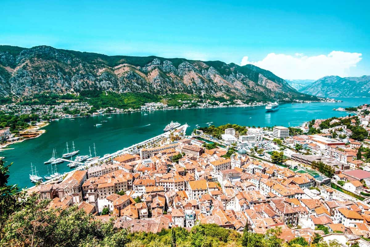 A view across Kotor in Montenegro with terracotta rooftops and mountains