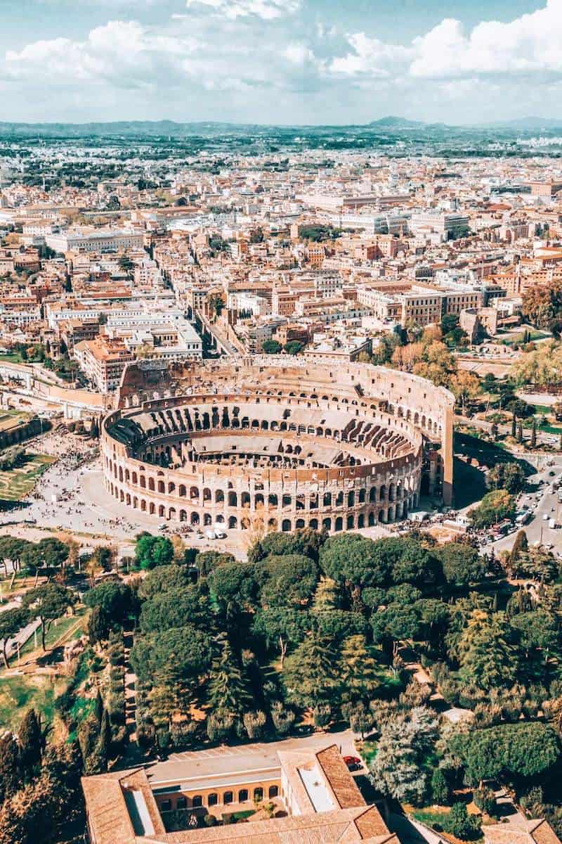 A far-reaching aerial view over the Colosseum and city of Rome