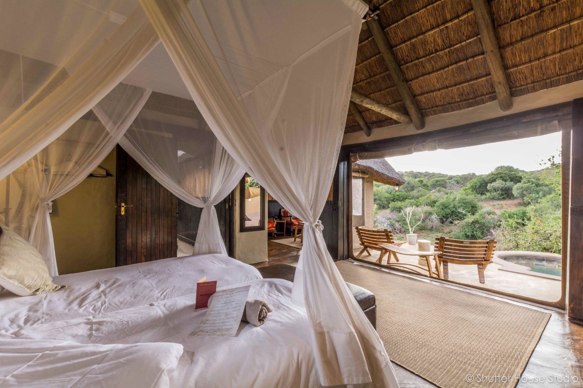 A luxury tented suite at a game reserve in South Africa, overlooking the wilderness
