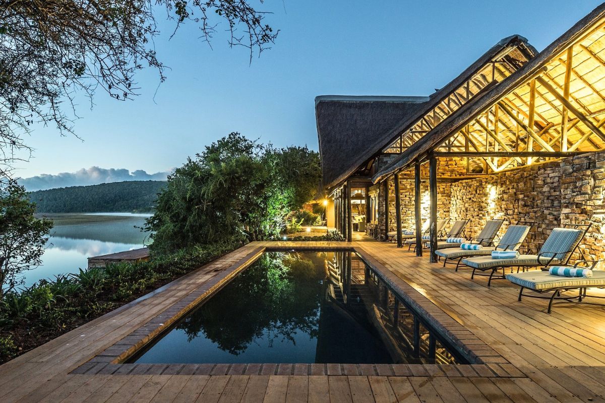 A private decking and pool at a luxury safari lodge in South Africa overlooking a river