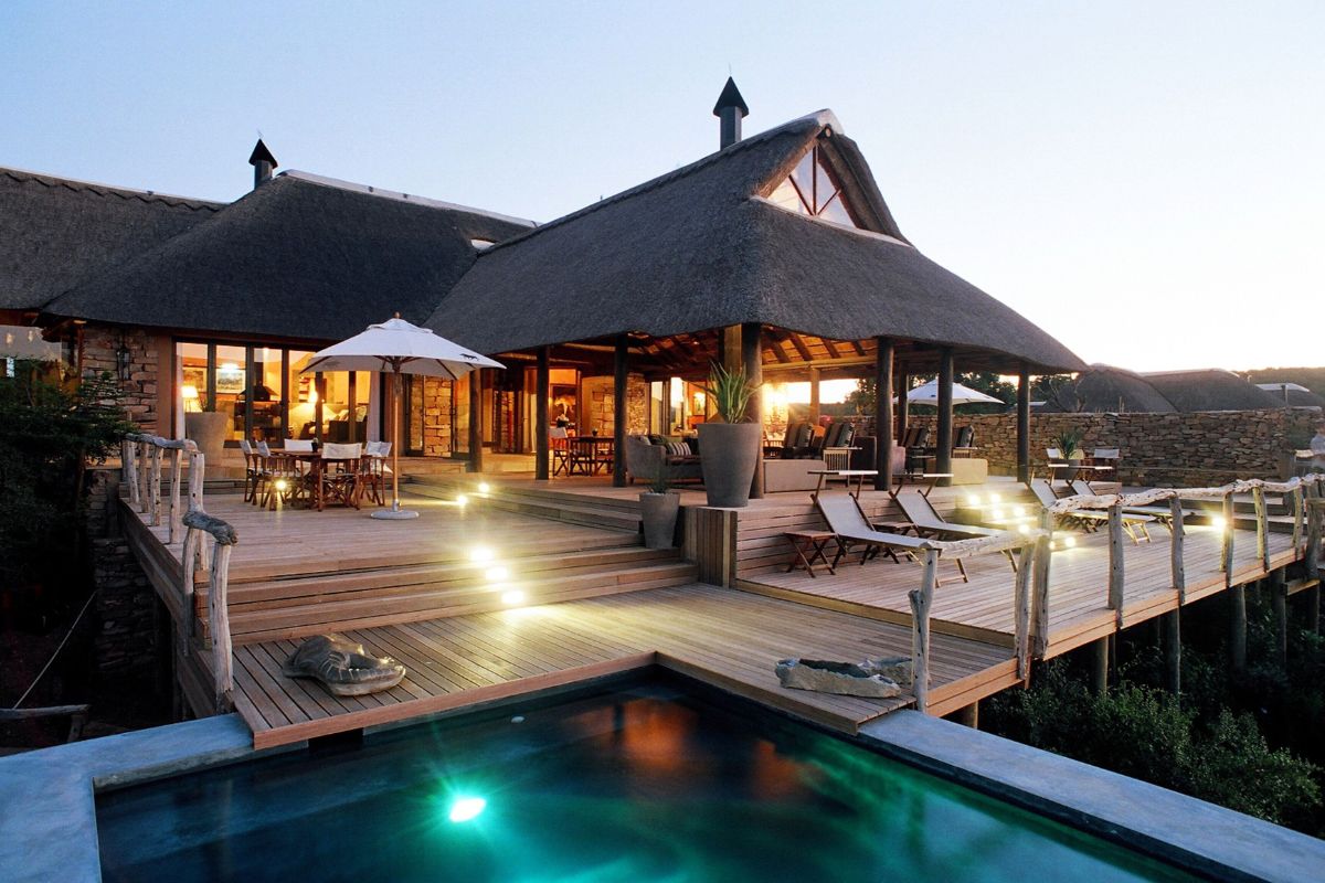 Outdoor decking at sunset at a five-star South Africa safari lodge
