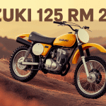 125 rm 2000 moto cross jaune vintage sur terrain