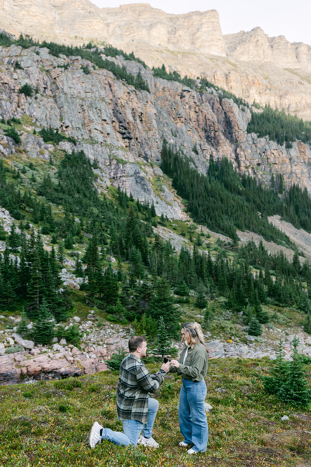 Banff proposal photographer capturing an intimate proposal at golden hour in the Canadian Rockies