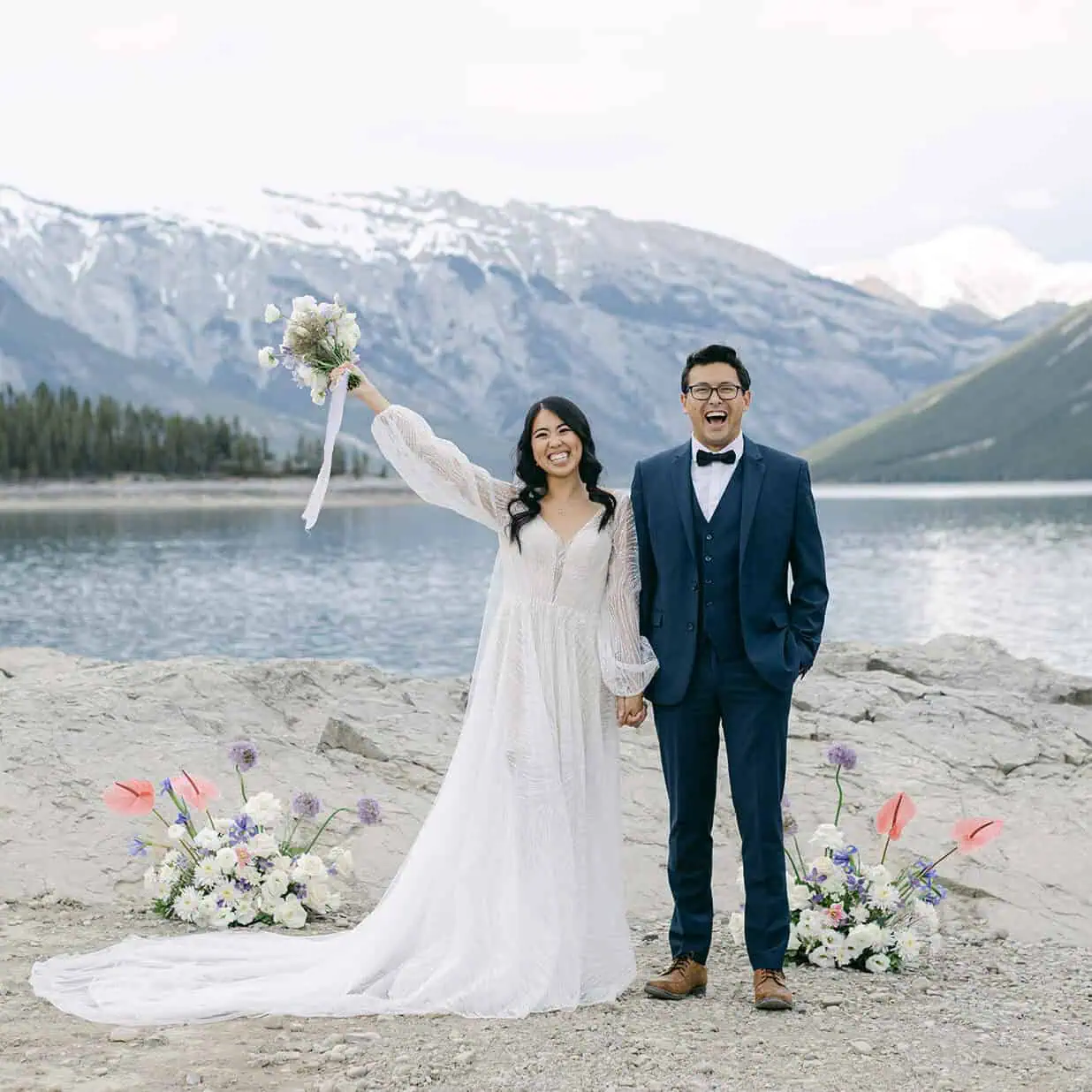 Couple exchanging vows during an Alberta elopement in the Canadian Rockies