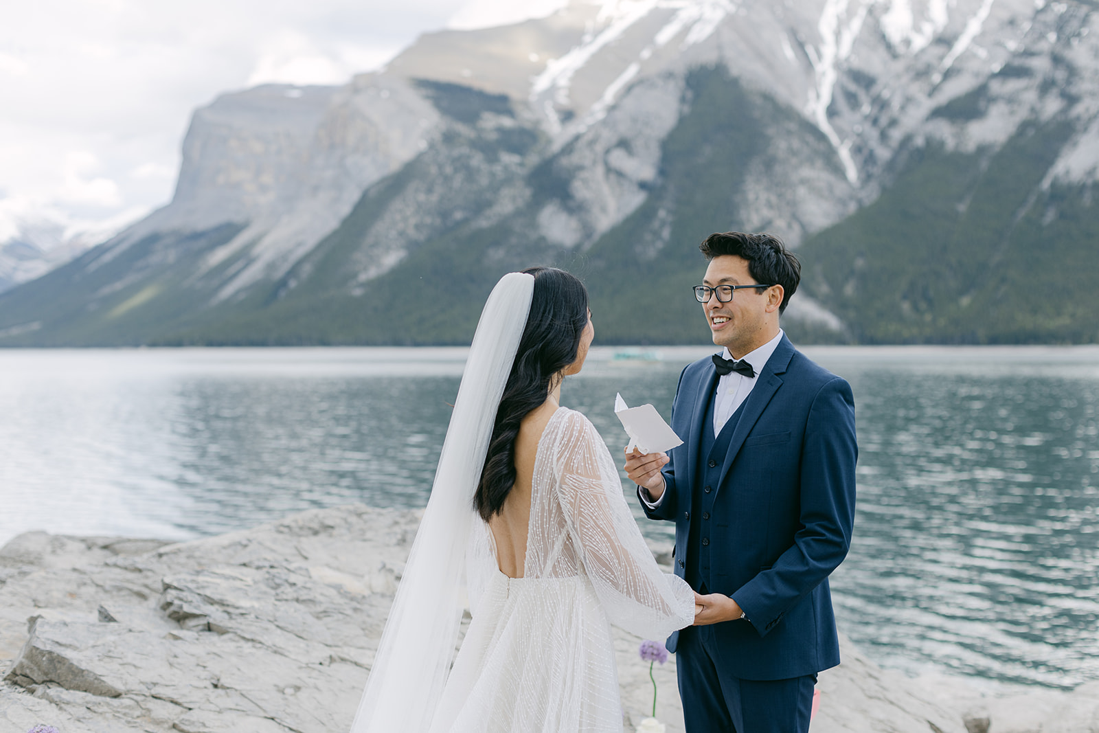 Banff wedding officiants guiding a lakeside ceremony with turquoise water and alpine peaks