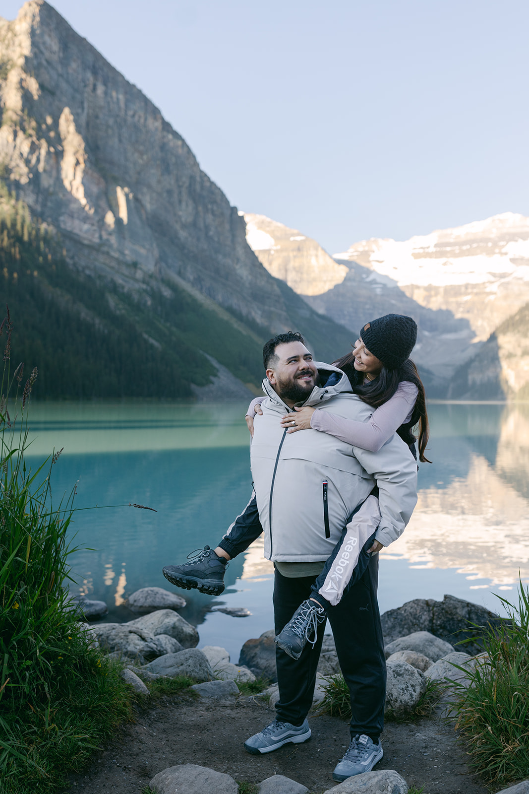 Banff engagement photographer photographing a romantic mountain session at sunrise