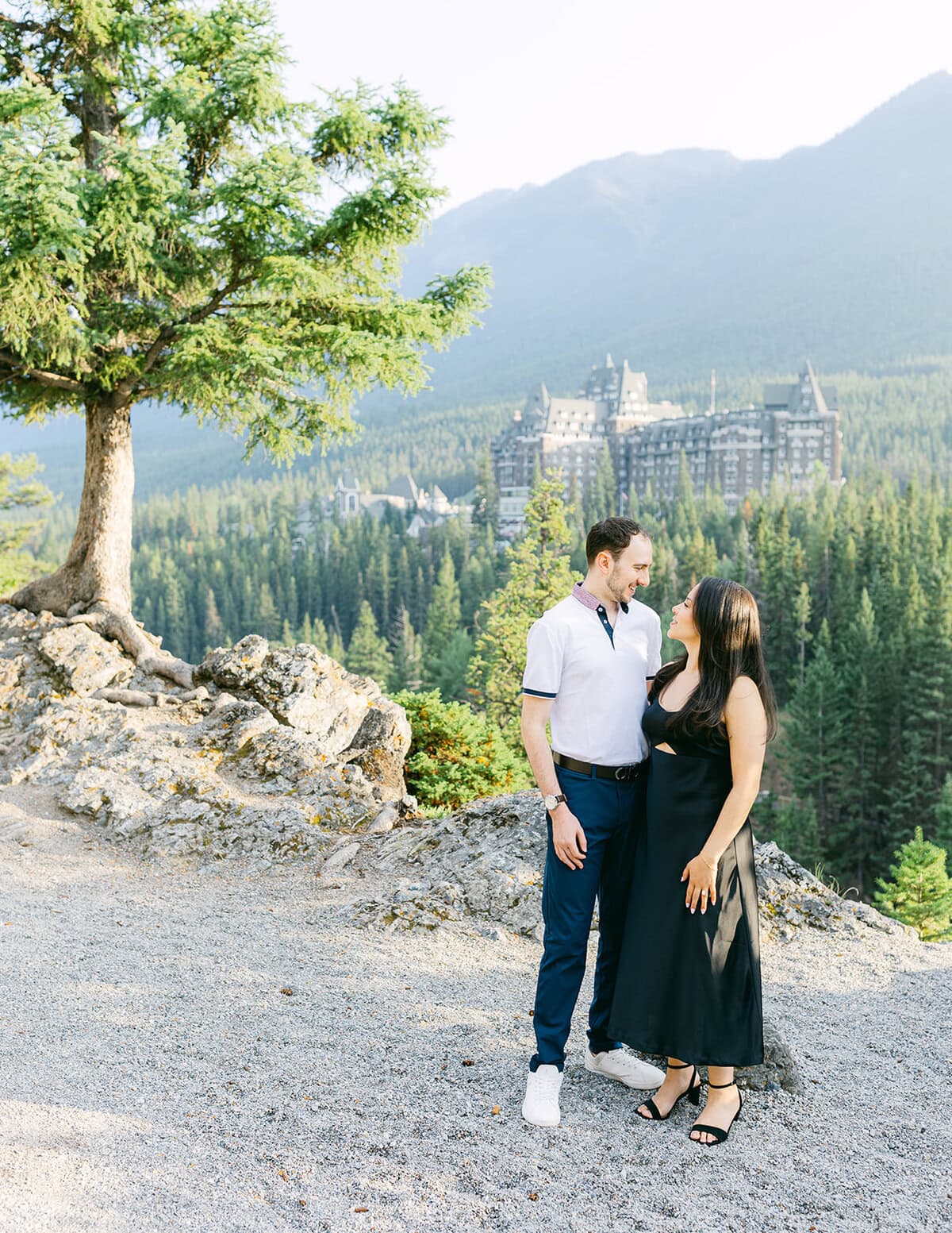 Banff engagement photographer photographing a couple celebrating their engagement in Banff