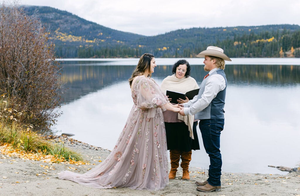 Jasper elopement with couple exchanging vows in the mountains