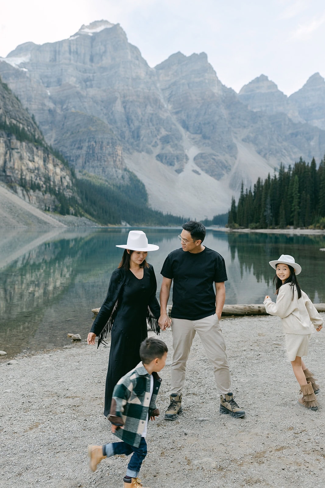 Lifestyle family photo in Banff with natural posing and candid movement outdoors