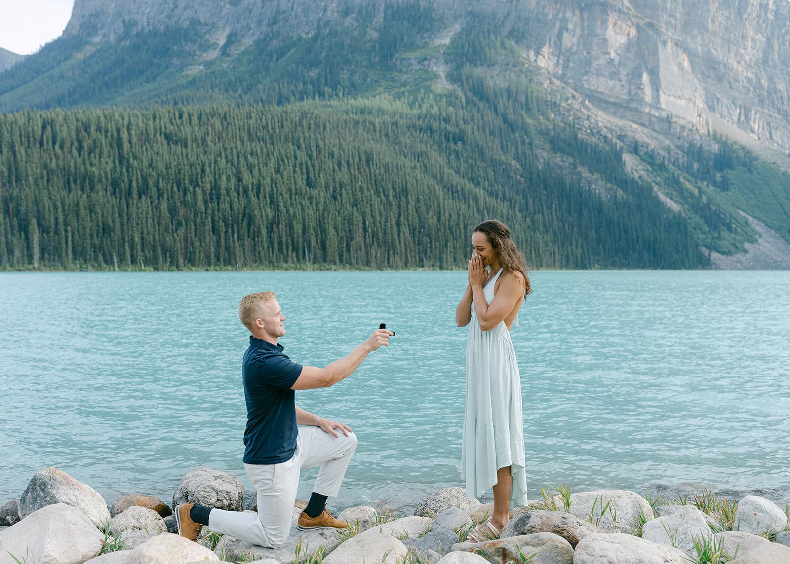 Lake Louise engagement photos with soft light and iconic alpine scenery