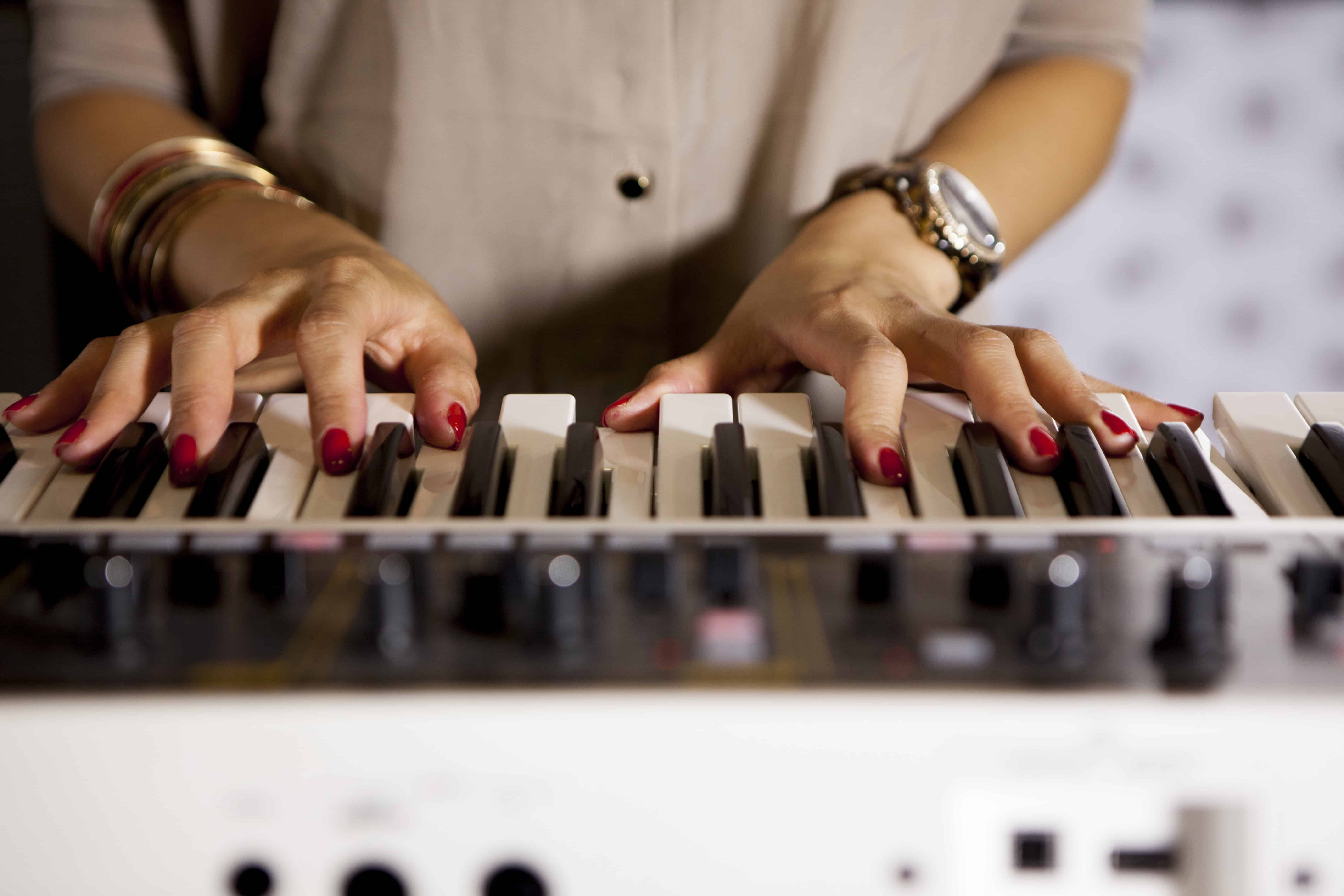 person playing keyboard