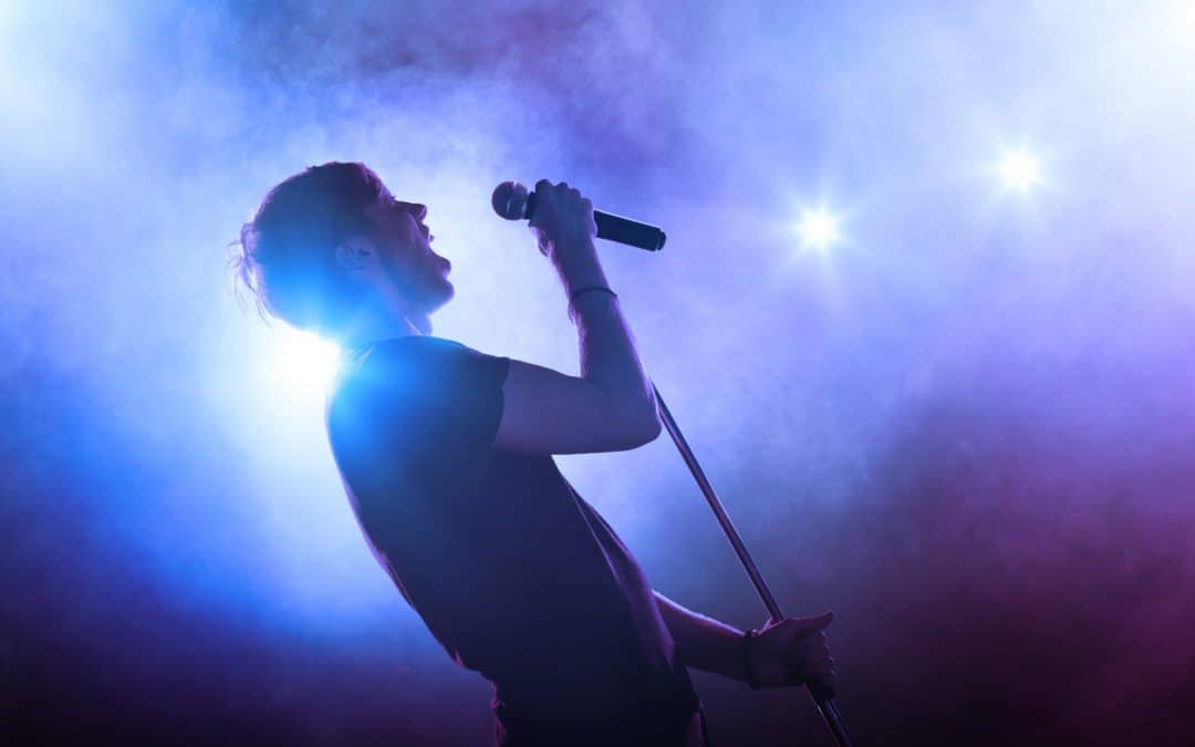 singer on-stage performing