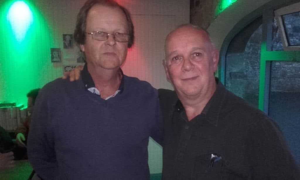 Donal Coghlan with a guest at an independent music community event.