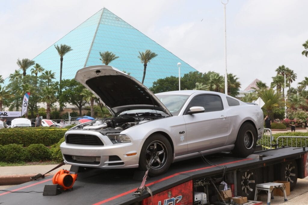 Silver Ford Mustang with open hood at Mustang Week Charlotte 2026.