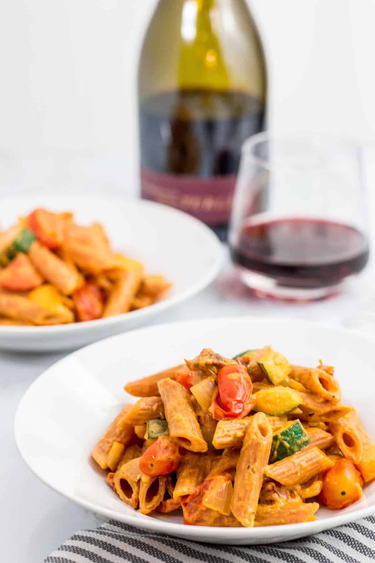 Vegetable filled healthy vegan creamy lentil pasta primavera