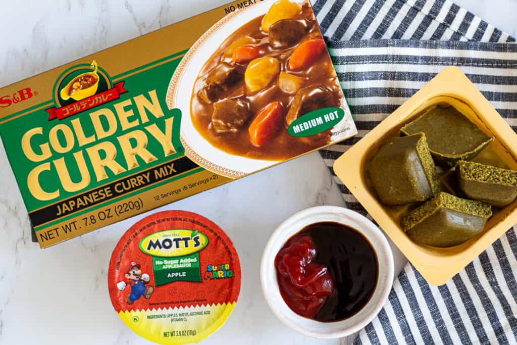 Japanese curry roux, ketchup, oyster sauce, and applesauce used to boost the flavor of beef curry.