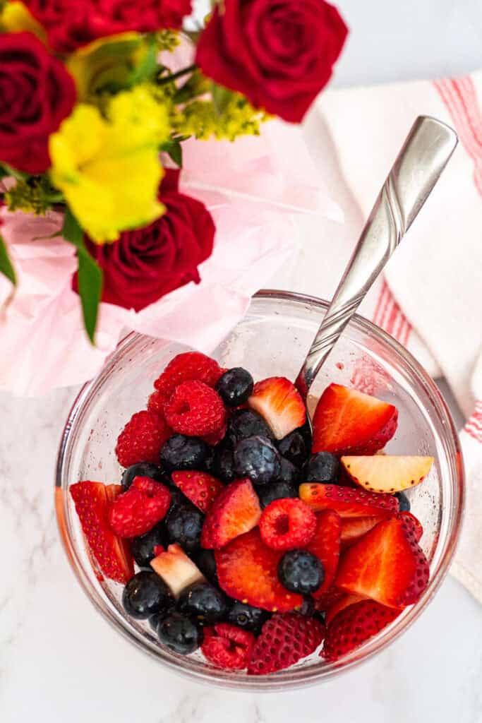 Fresh mixed berries lightly tossed with sugar for serving with chocolate mousse
