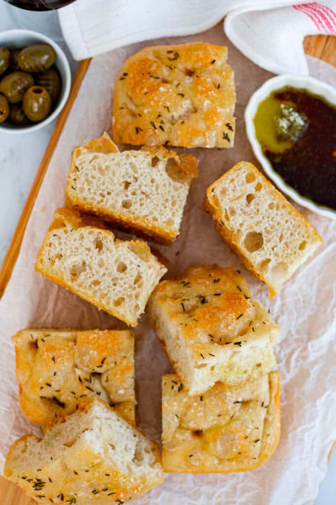 Small-batch sourdough discard focaccia cut into squares for dipping and sharing