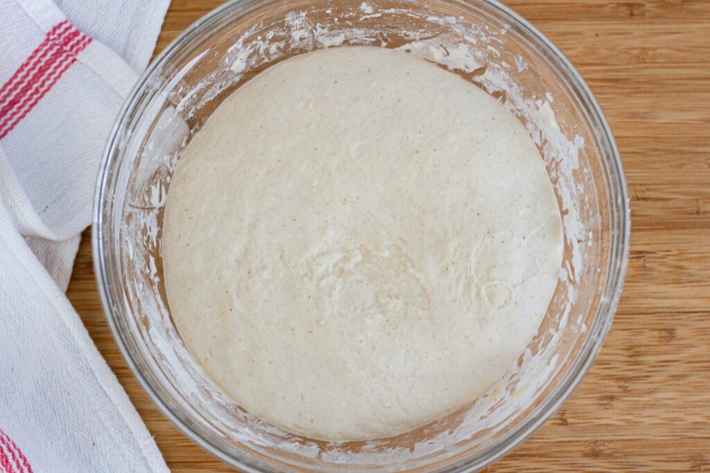 Sourdough discard focaccia dough after bulk rise, doubled and airy