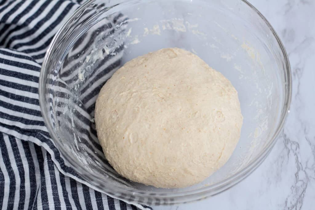 Smooth and elastic sourdough discard pizza dough after folding
