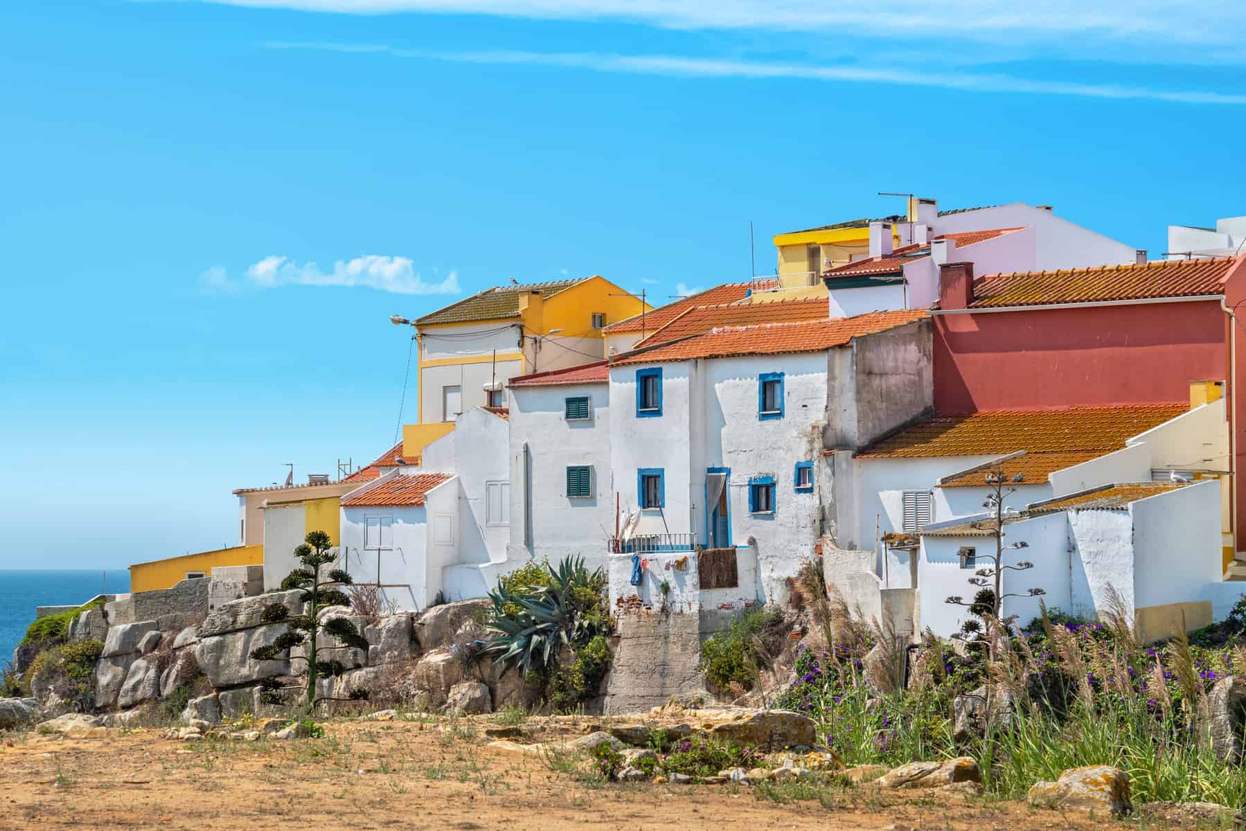 View to old portuguese houses on atlantic ocean coast. Peniche, Estremadura, Portugal