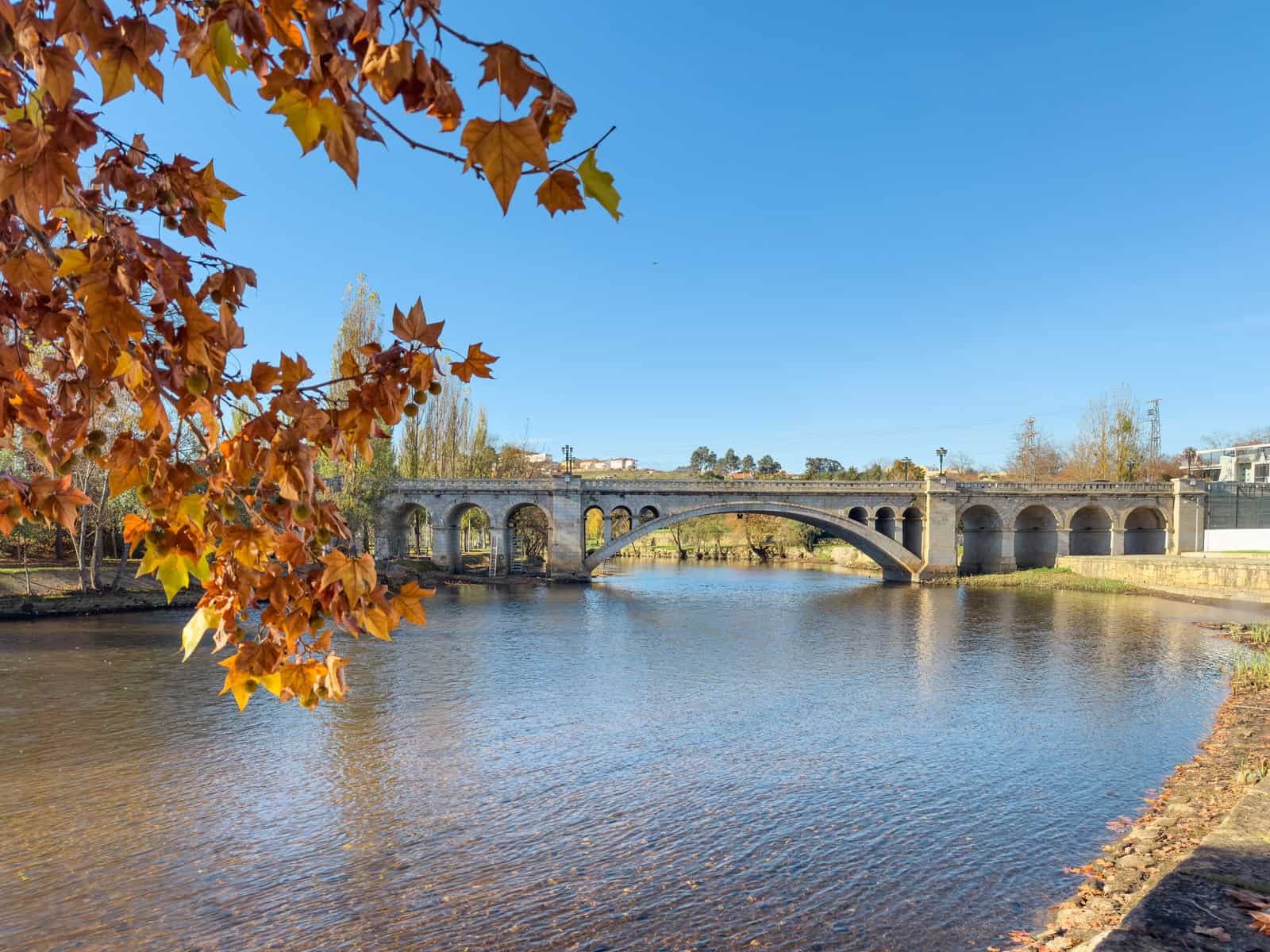 View along the Tamega river city park in Chaves, Portugal.
