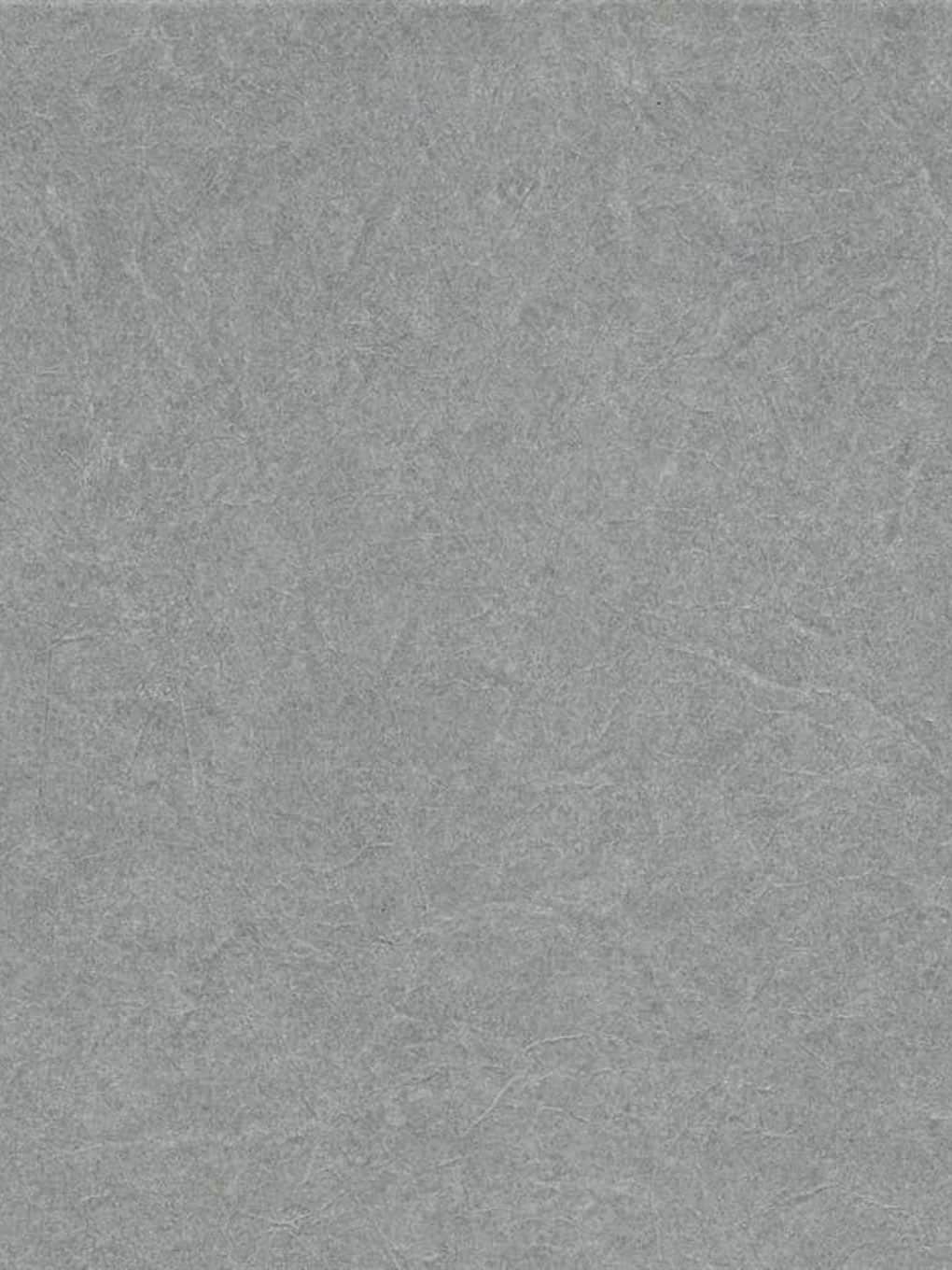 Gray textured stone surface for modern interior design and decor.