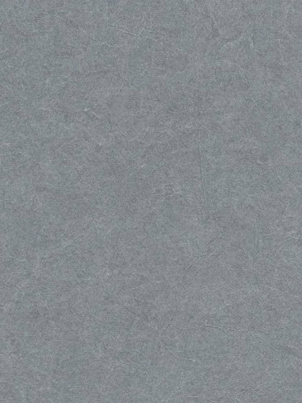Gray textured wall surface for interior decor or background use.