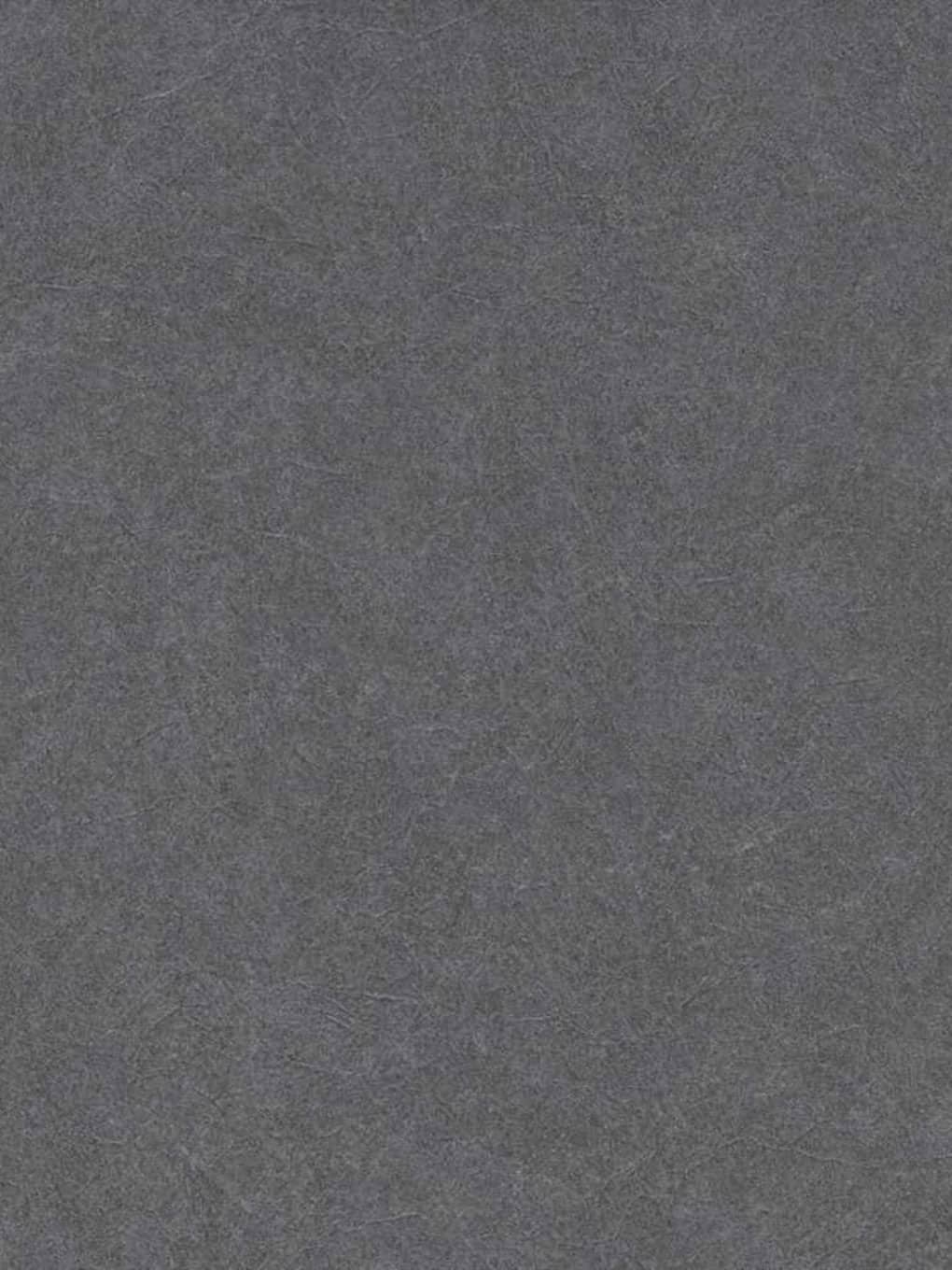 Dark gray textured stone surface for modern interior design.