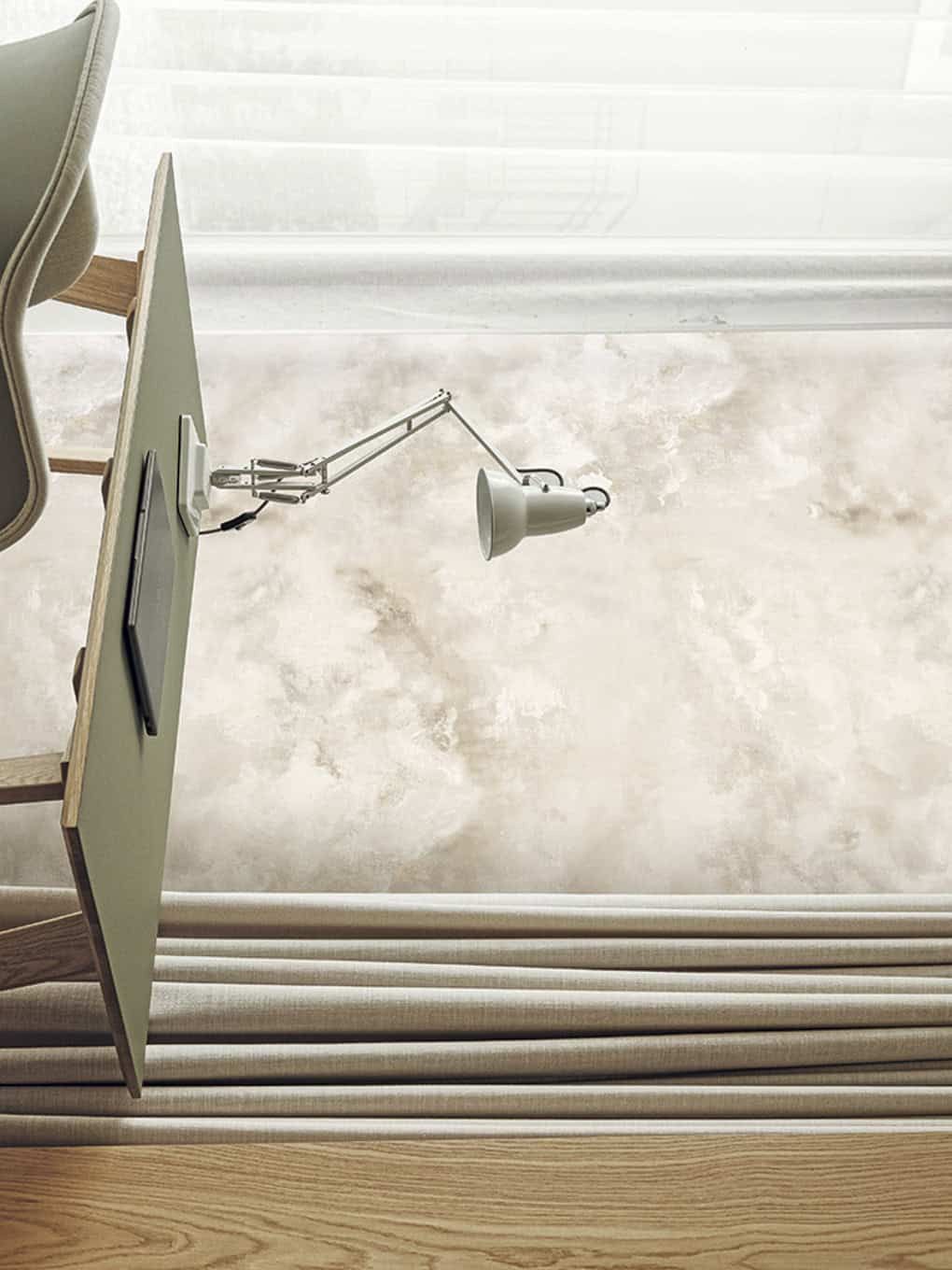 Modern minimalist desk with adjustable white lamp and beige curtains.