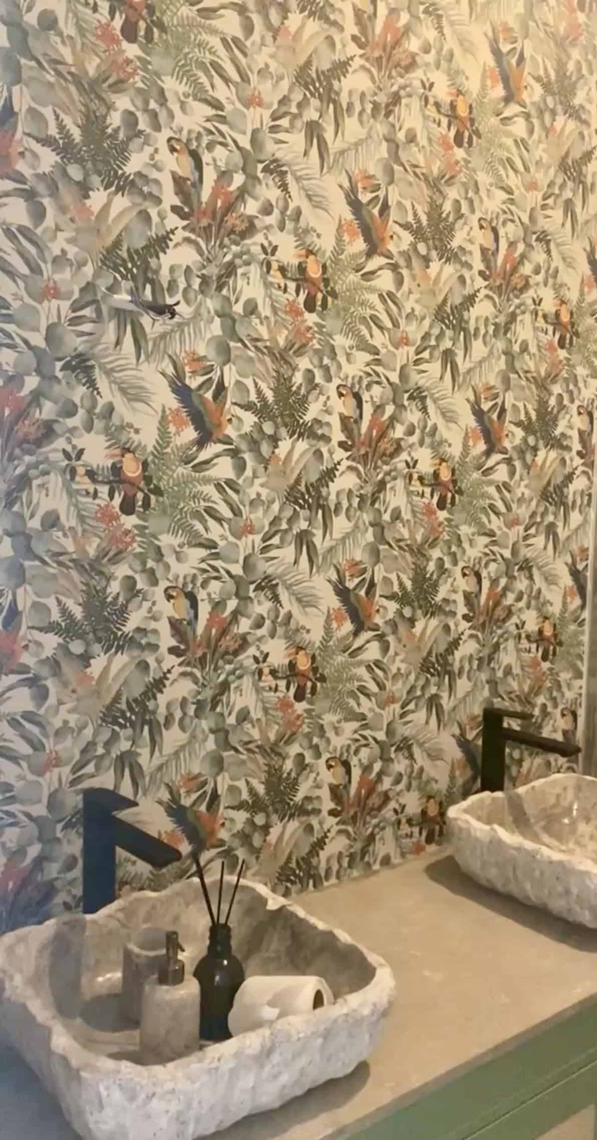 Decorative tropical leaf wallpaper with vibrant bird motifs for eco-friendly villa interiors.