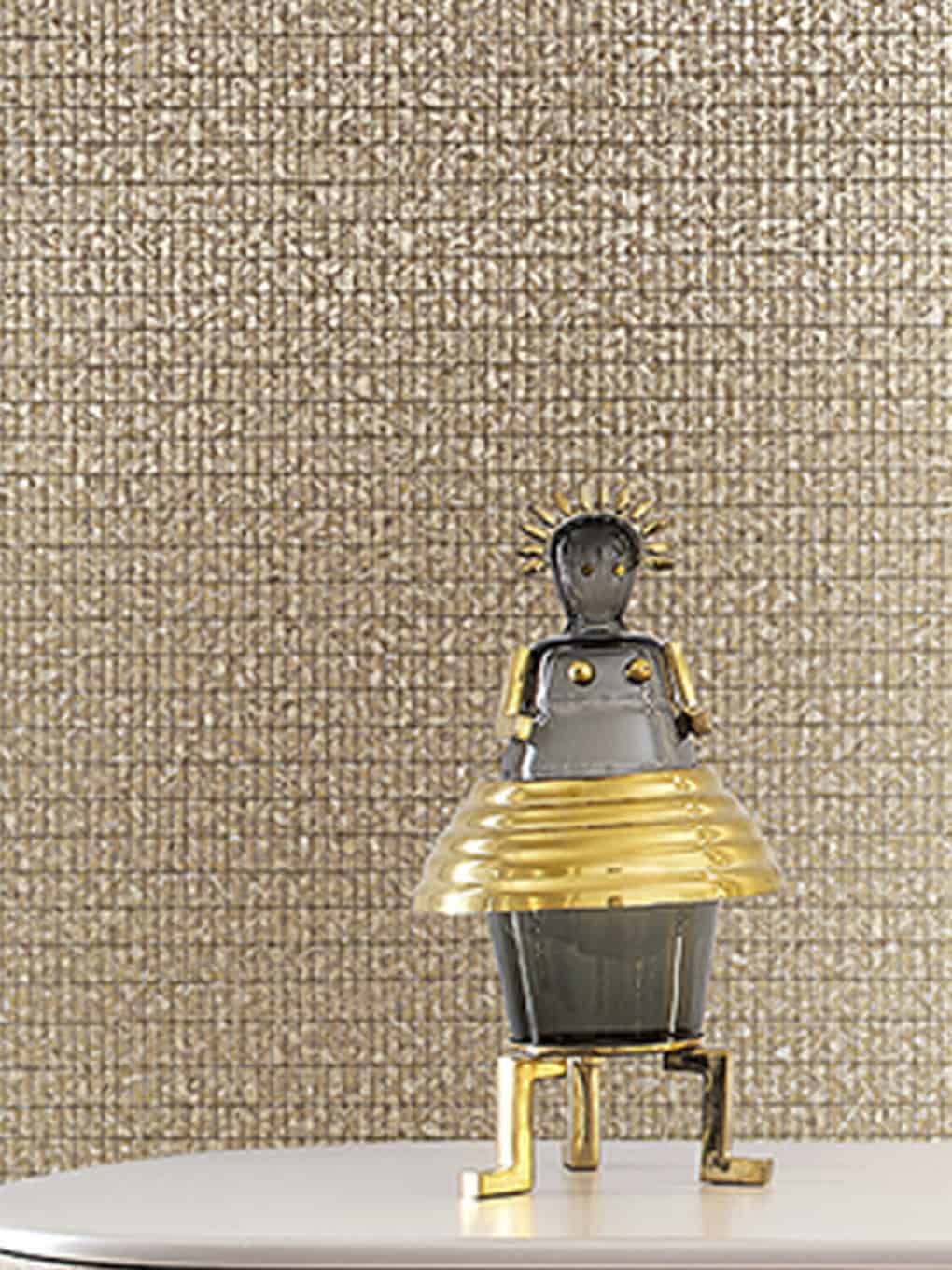 Decorative figurine for home decor, featuring a stylish robot-inspired design with gold accents.