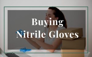 Woman examining nitrile gloves, considering purchase options.