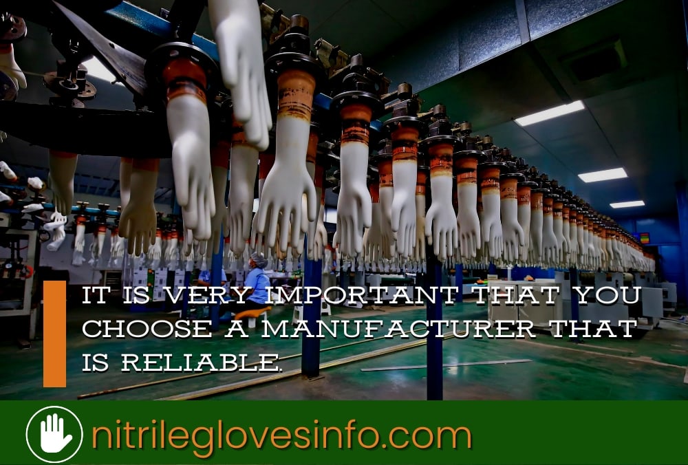 Nitrile glove manufacturing process: rows of gloves hanging on a production line. Choose a reliable manufacturer for your farm's best nitrile gloves.