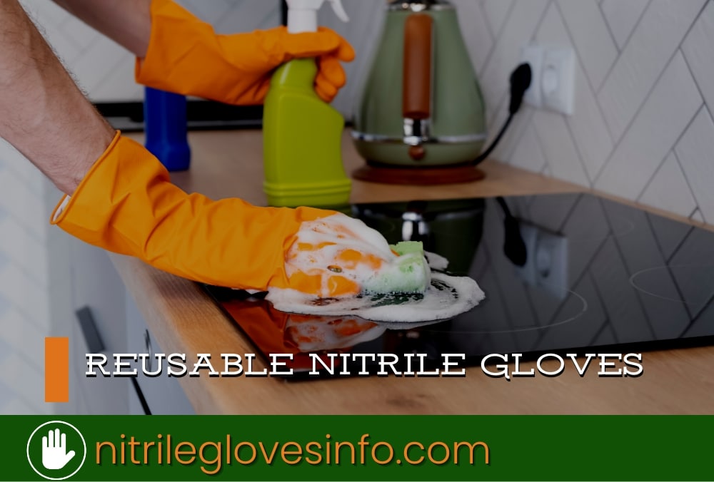 Person cleaning stovetop with reusable nitrile gloves.