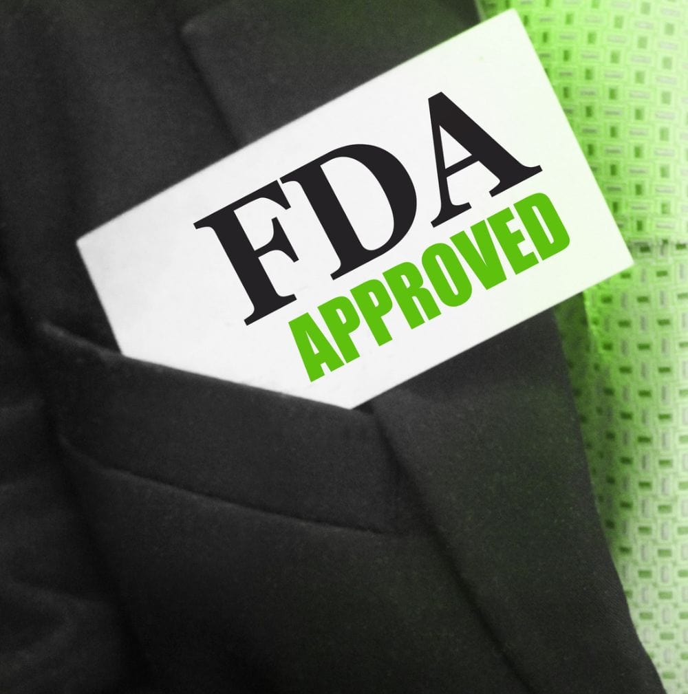 FDA-approved label in a suit pocket.