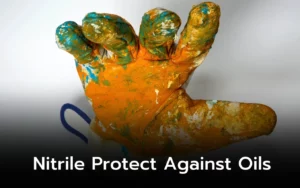 Paint-splattered nitrile glove demonstrating oil resistance.