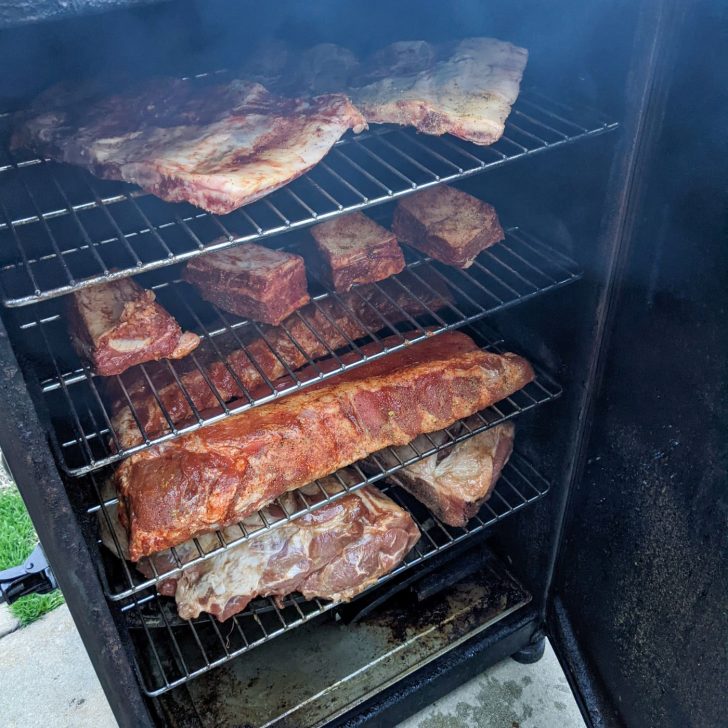 Irresistible Smoked Ribs with Pineapple: You Won't Believe This Flavor Combination! | The Not so Modern Housewife Ribs in smoker - pineapple glazed pork ribs