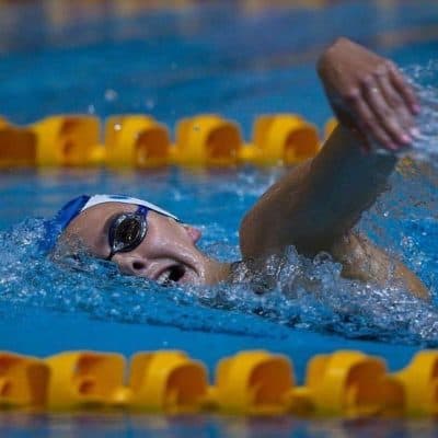 Swimmer in pool, representing New Plymouth Physiotherapy’s focus on sports injury recovery and physiotherapy services.