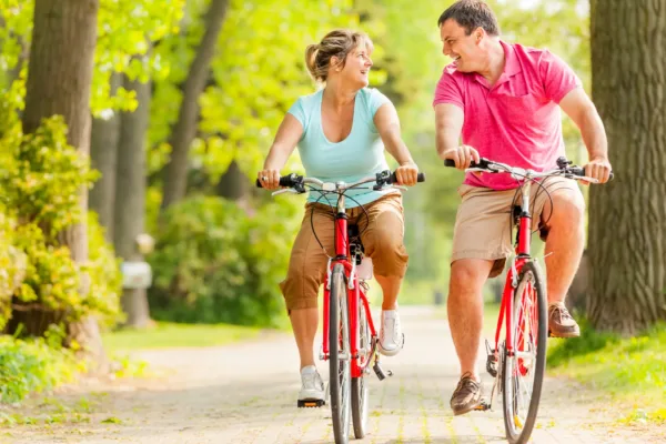 Couple riding bikes
