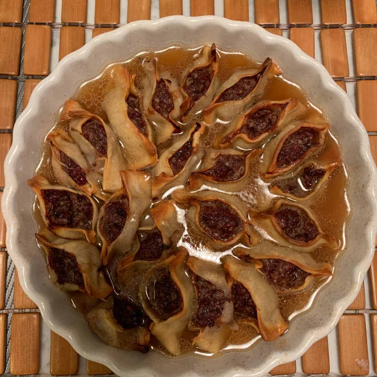 Manti in a baking dish.